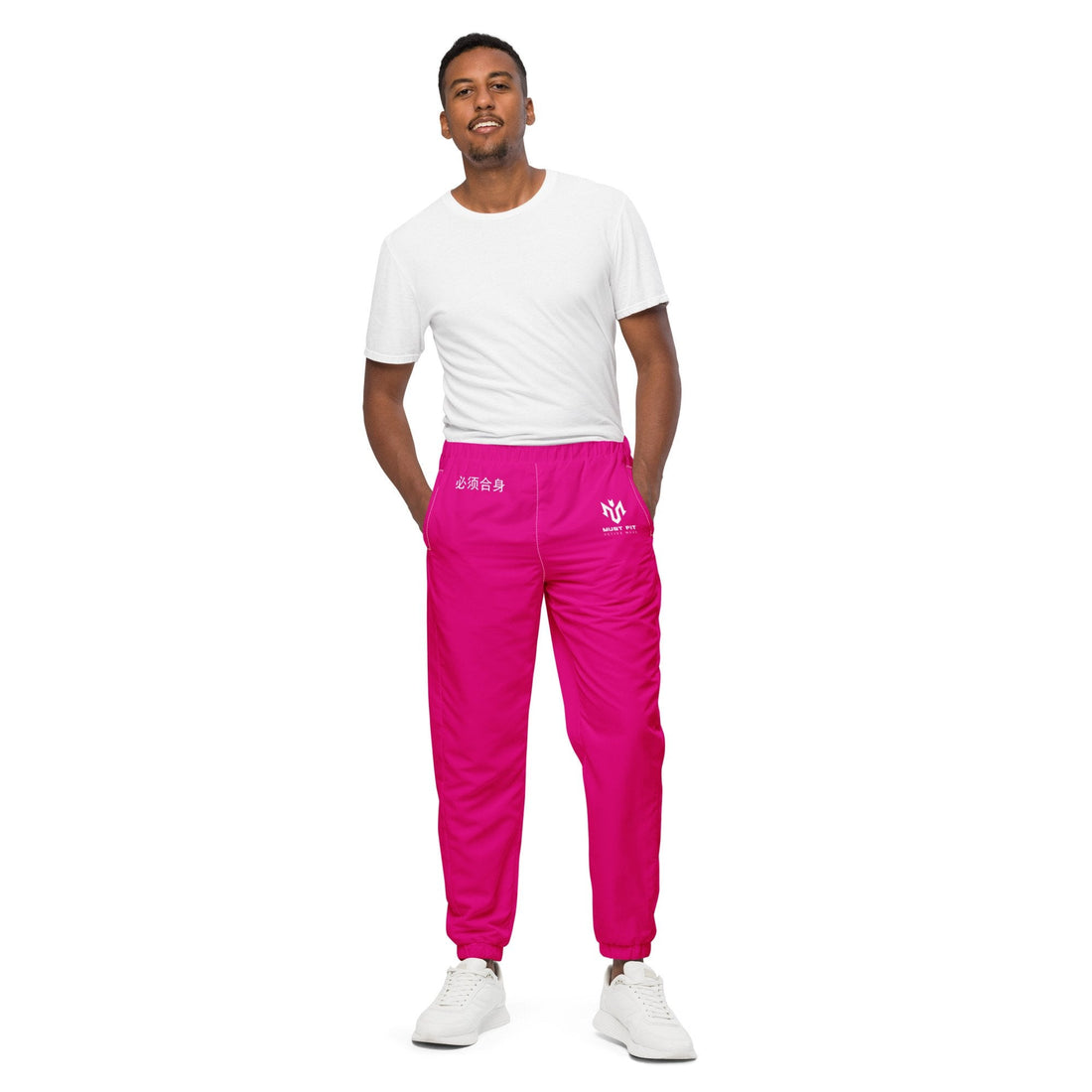 "M.U.S.T. Fit® Sports unisex track pants with a tapered fit, adjustable drawstring waist, and side pockets – made from soft, durable fabric for all-day comfort, active movement, and effortless street style."