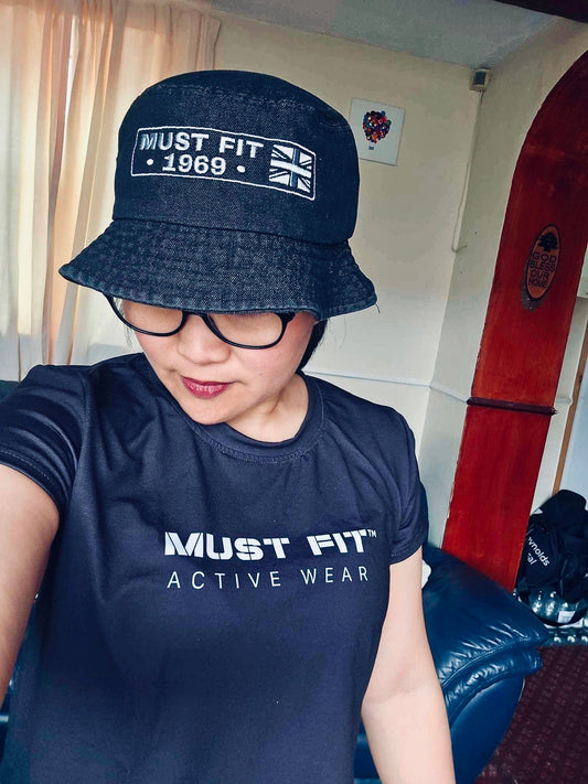 "M.U.S.T. Fit® Sports cropped top with a flattering cut, soft stretch fabric, and bold logo detailing – designed for confidence, comfort, and movement whether you're at the gym or styling it casually."
